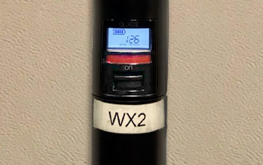 Image showing ON button of handheld mic